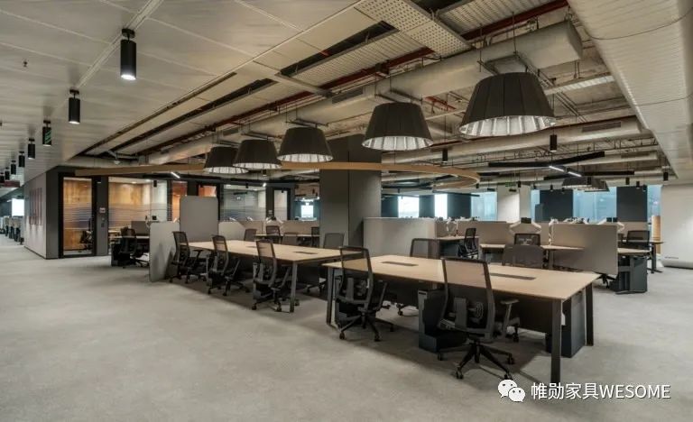 How should companies design their work areas?